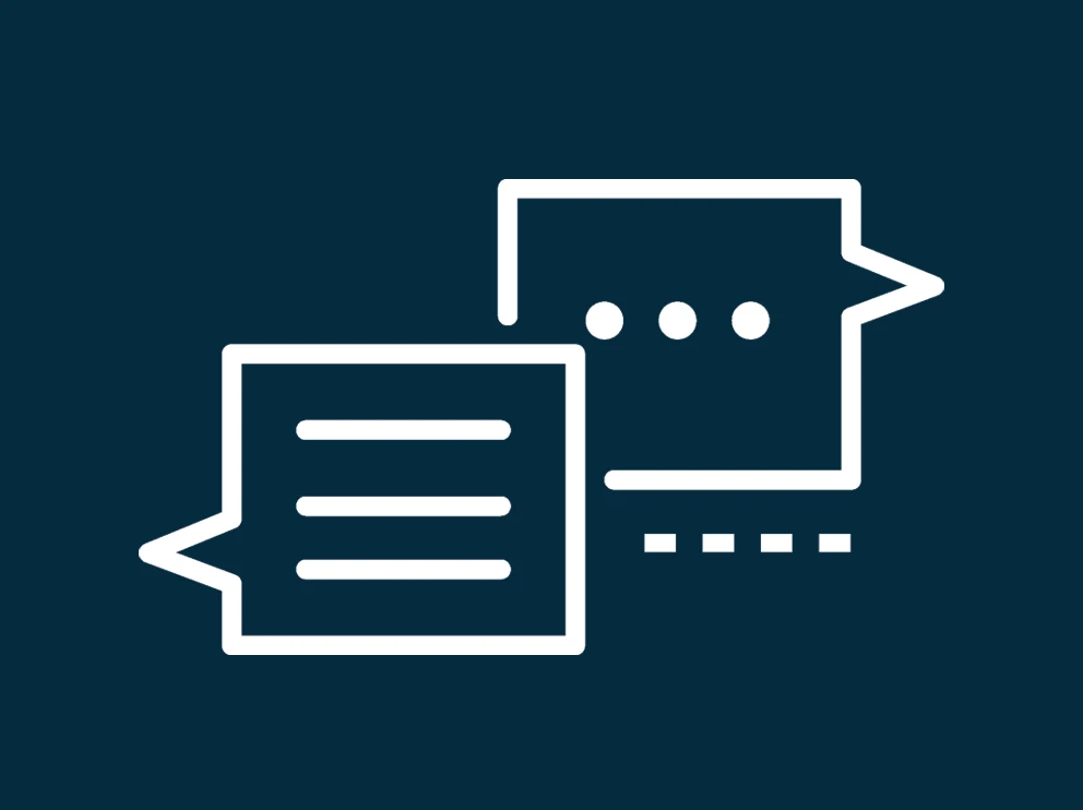 two white speech bubble icons on dark blue background
