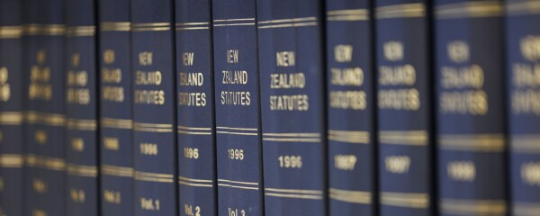 A row of book spines on a shelf