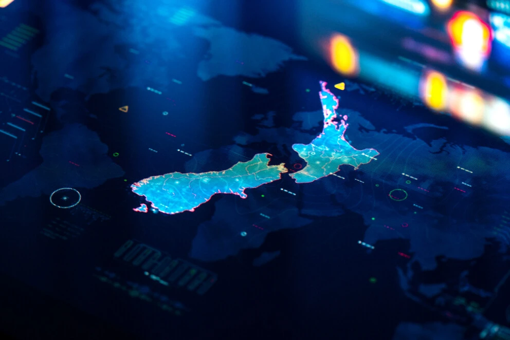 Digital style map of New Zealand on a blue digital screen 