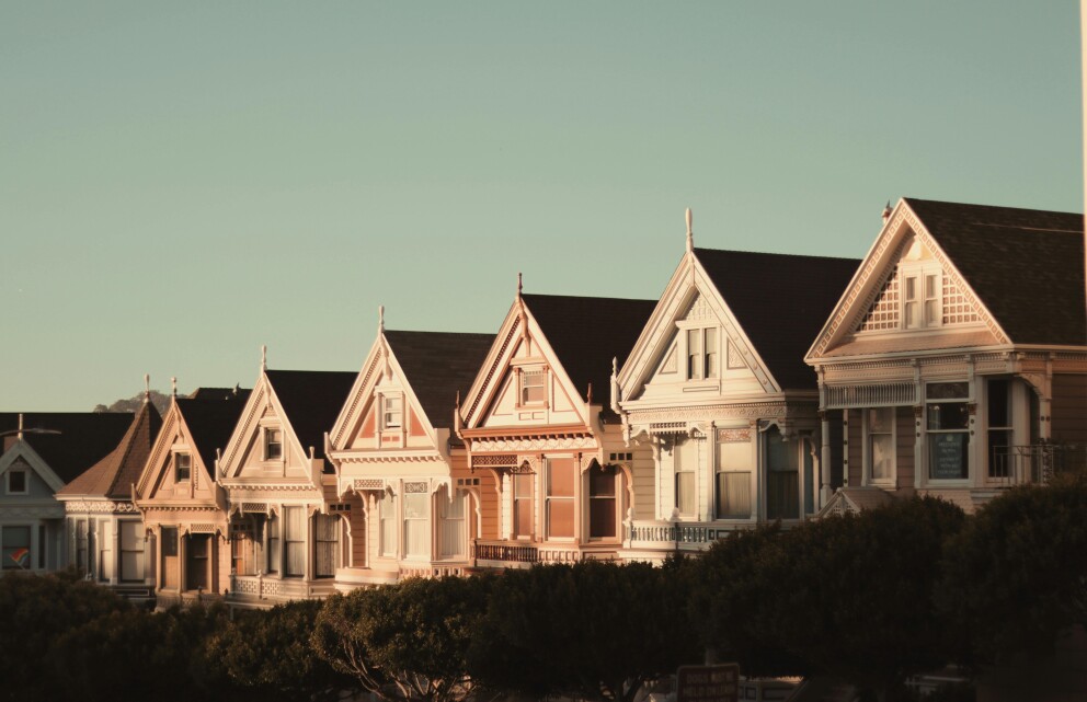 A row of six Victorian style homes